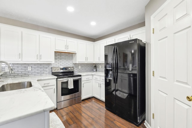 kitchen featuring white cabinetry, sink, backsplash, black refrigerator with ice dispenser, and stainless steel electric range