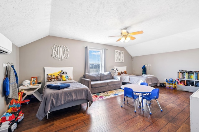 bedroom featuring lofted ceiling, a textured ceiling, dark wood-type flooring, and ceiling fan