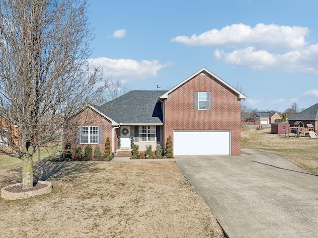 front facade featuring a garage and a front yard