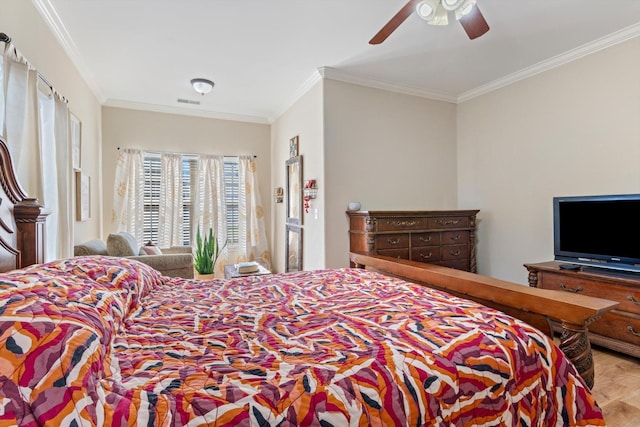 bedroom with crown molding, light parquet flooring, and ceiling fan