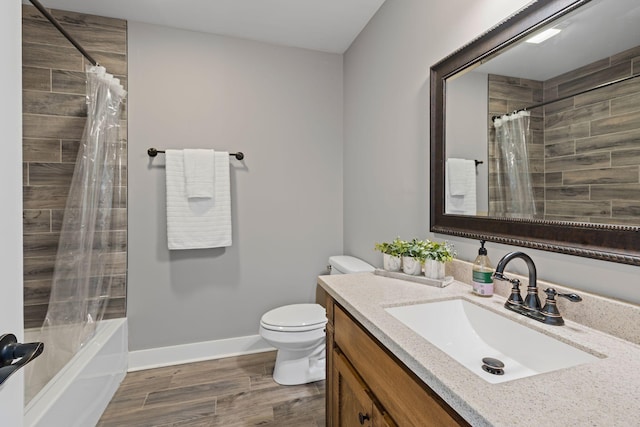 full bathroom featuring vanity, shower / bath combination with curtain, and toilet