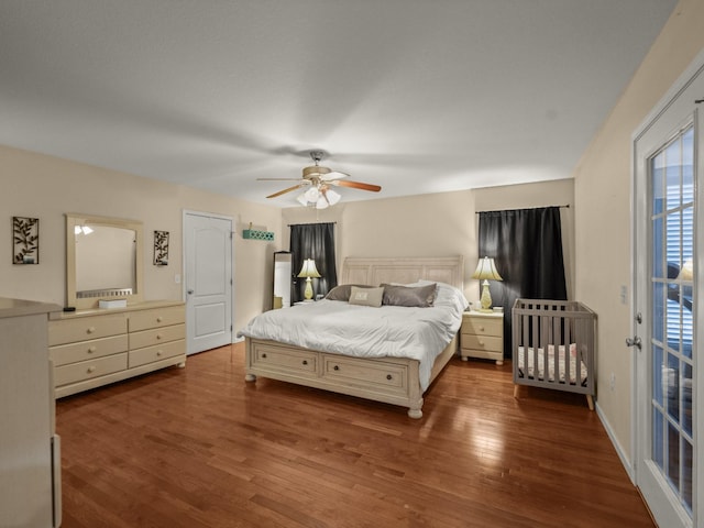 bedroom featuring hardwood / wood-style floors and ceiling fan