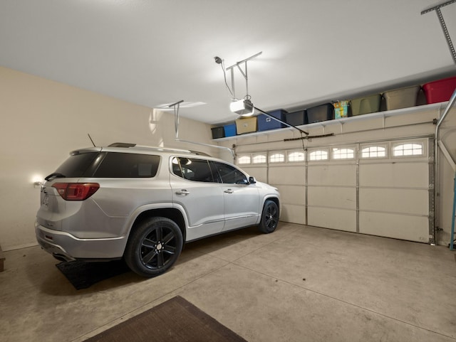 garage featuring a garage door opener