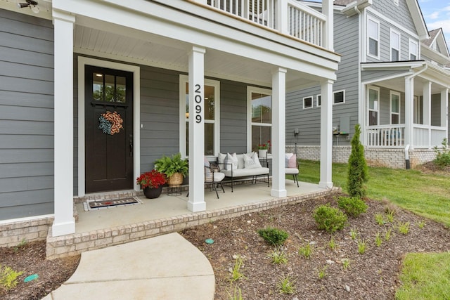 doorway to property with covered porch