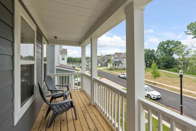 balcony featuring covered porch