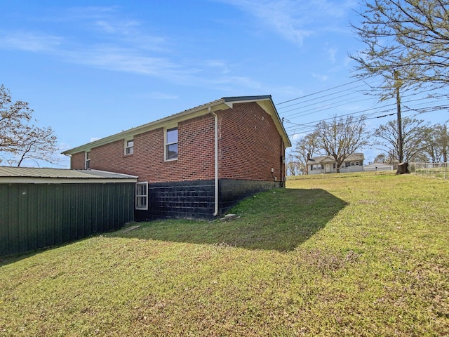 615 Lafayette Ct, Clarksville, TN 37042 - back of house with brick siding and a lawn