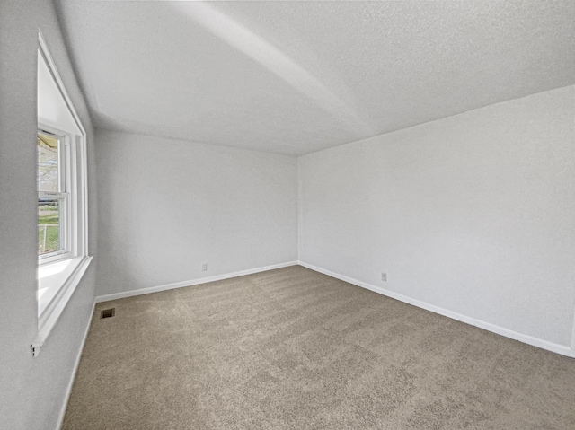 615 Lafayette Ct, Clarksville, TN 37042 - spare room featuring baseboards, visible vents, carpet flooring, and a textured ceiling