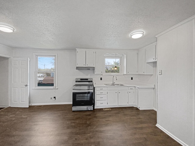 615 Lafayette Ct, Clarksville, TN 37042 - kitchen featuring white cabinetry, light countertops, dark wood-type flooring, stainless steel electric range oven, and a sink