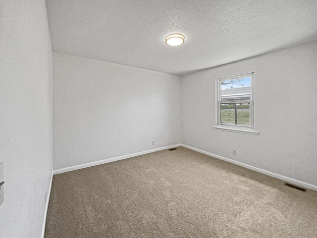 615 Lafayette Ct, Clarksville, TN 37042 - spare room featuring carpet floors, a textured ceiling, baseboards, and visible vents
