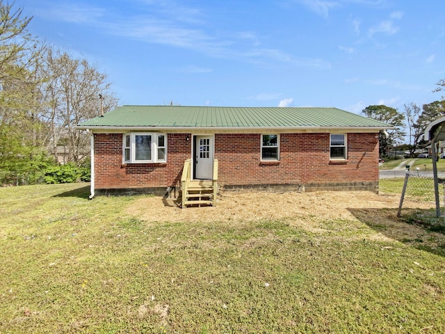 615 Lafayette Ct, Clarksville, TN 37042 - single story home featuring a front yard, brick siding, entry steps, and metal roof