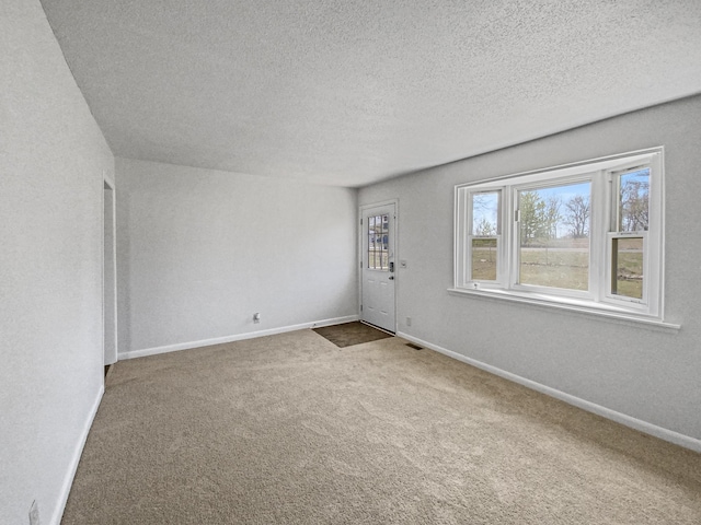 615 Lafayette Ct, Clarksville, TN 37042 - carpeted spare room featuring baseboards and a textured ceiling