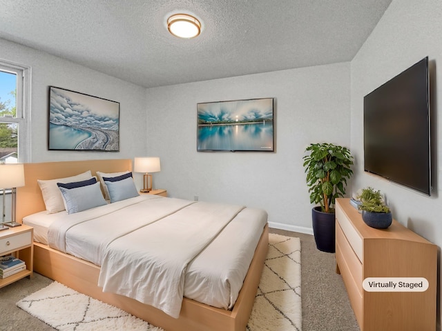 615 Lafayette Ct, Clarksville, TN 37042 - bedroom with carpet, baseboards, and a textured ceiling