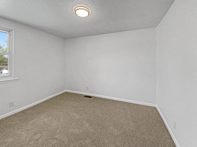 615 Lafayette Ct, Clarksville, TN 37042 - spare room with carpet, baseboards, and a textured ceiling