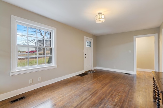 entrance foyer featuring hardwood / wood-style flooring