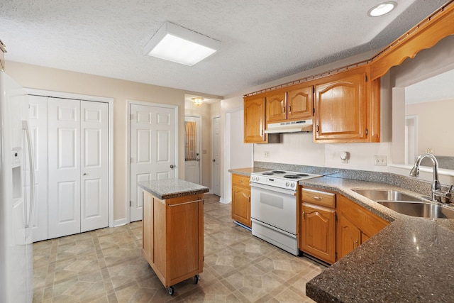 kitchen with a kitchen island, sink, electric range, and a textured ceiling