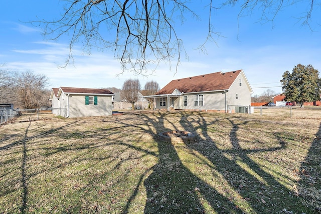 view of yard with an outbuilding