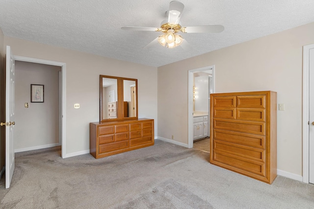 bedroom with light carpet, connected bathroom, a textured ceiling, and ceiling fan