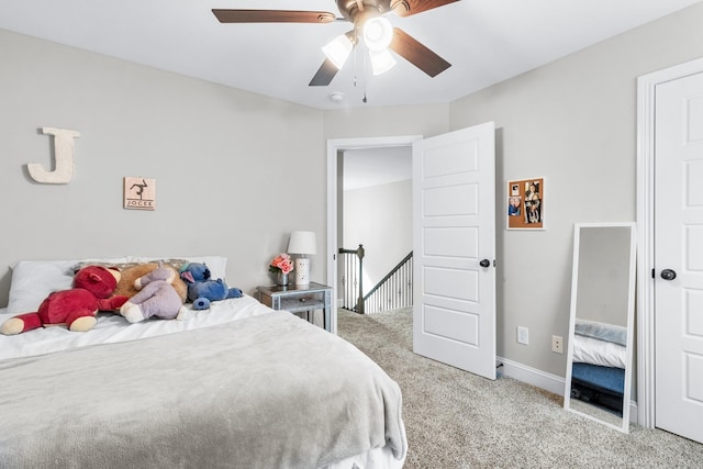 bedroom featuring ceiling fan and light colored carpet