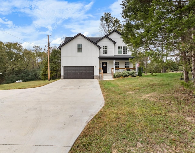 modern farmhouse style home featuring a garage, a front lawn, and a porch