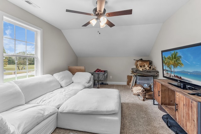 living room with light carpet, vaulted ceiling, and ceiling fan