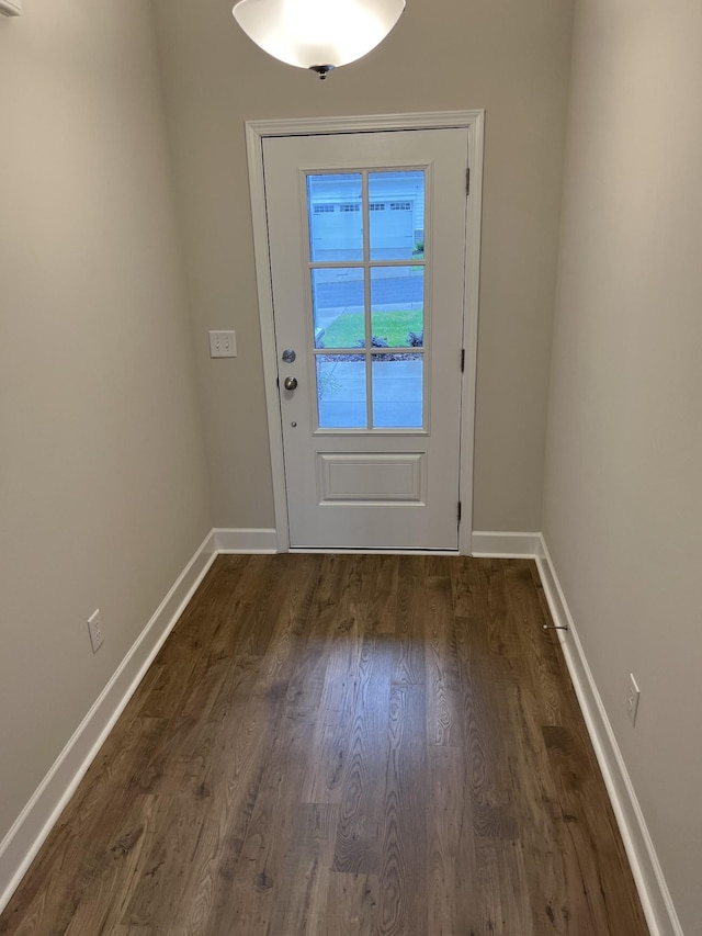 doorway featuring dark hardwood / wood-style floors