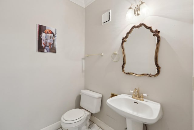 bathroom with sink and toilet