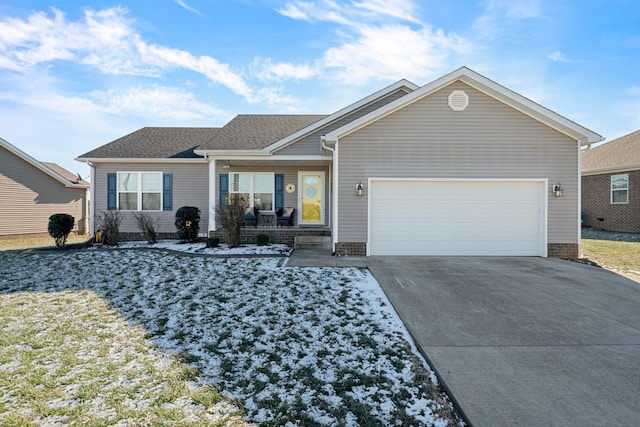 ranch-style house with a garage and a porch