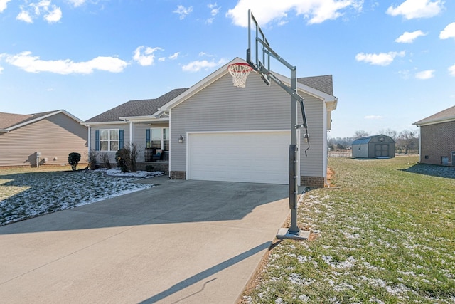 ranch-style home featuring a storage shed, a garage, and a front lawn