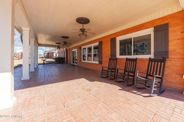 view of patio featuring ceiling fan and covered porch