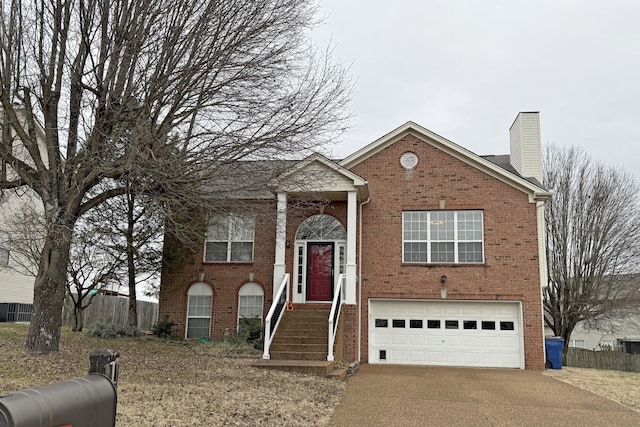 view of front of home with a garage