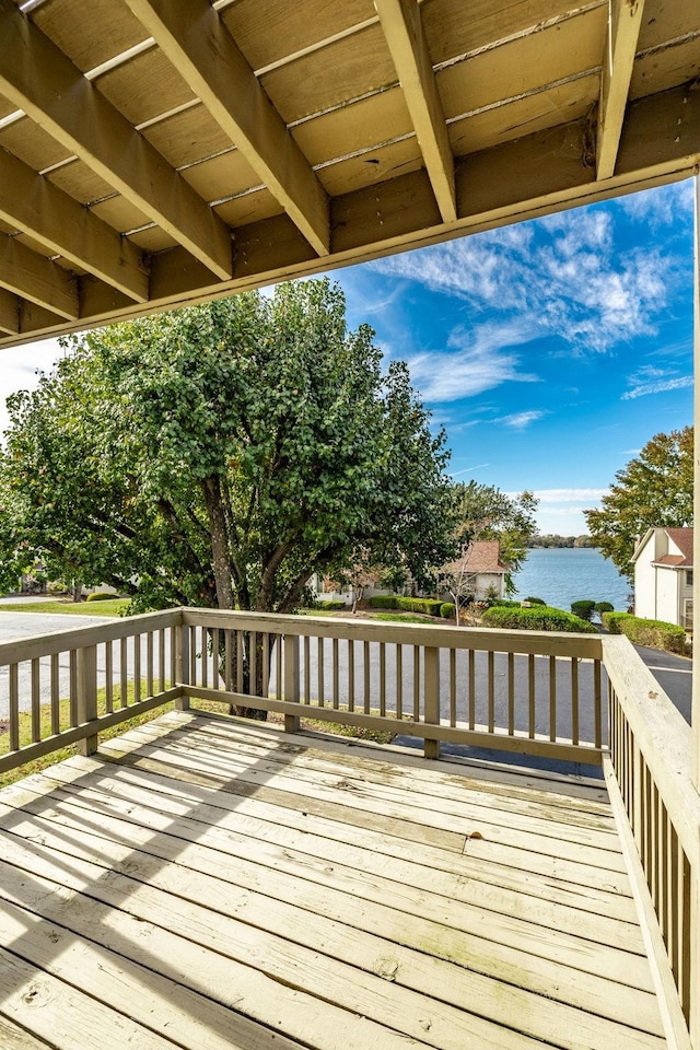 deck featuring a water view