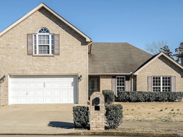 front of property with a garage