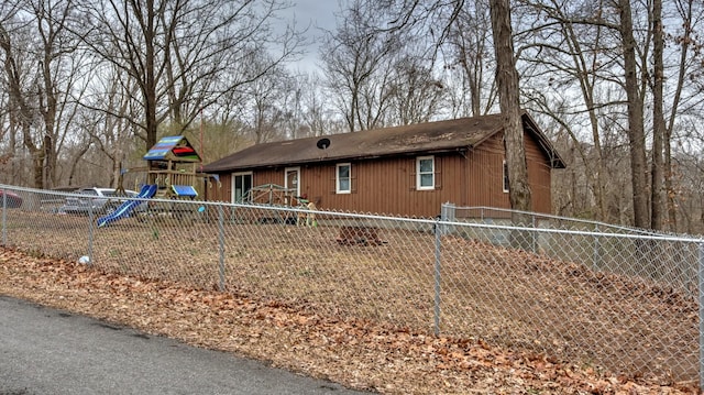 view of front of property featuring a playground