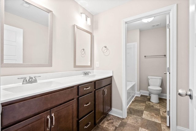 full bathroom featuring vanity, shower / tub combination, and toilet