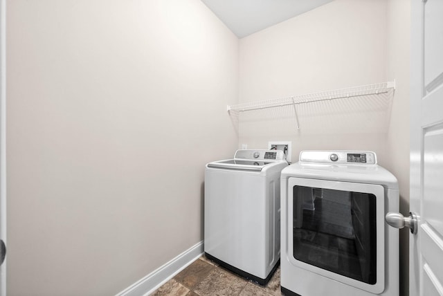 laundry room featuring separate washer and dryer