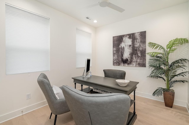 home office featuring ceiling fan and light wood-type flooring