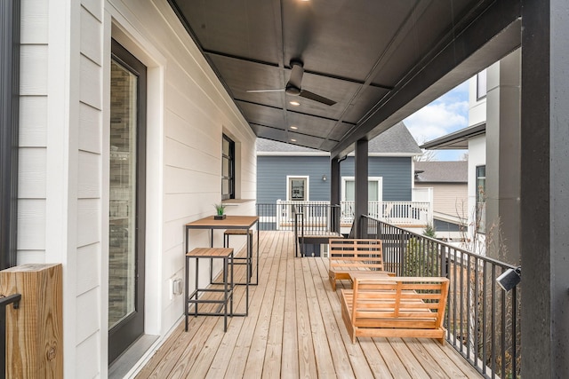 wooden deck with ceiling fan