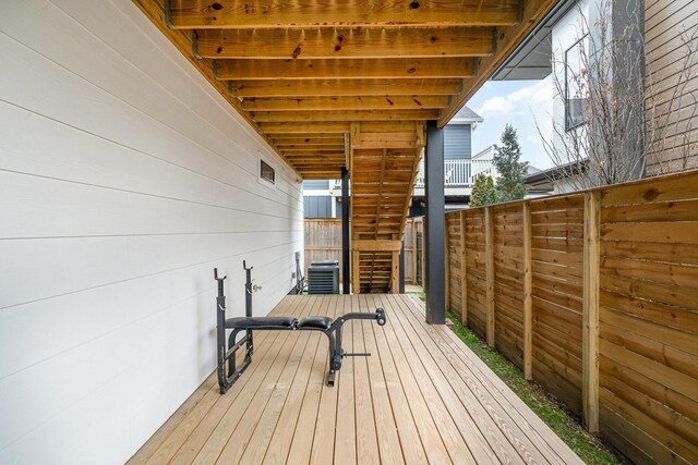 wooden terrace with central AC unit