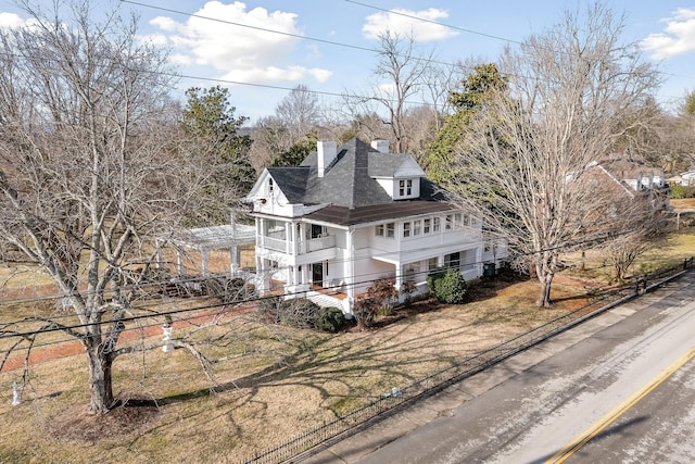 victorian-style house featuring a balcony