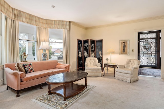 carpeted living room with ornamental molding