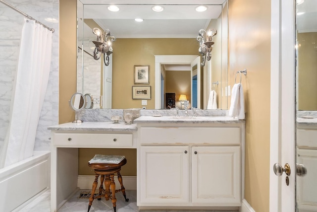 bathroom featuring vanity and ornamental molding