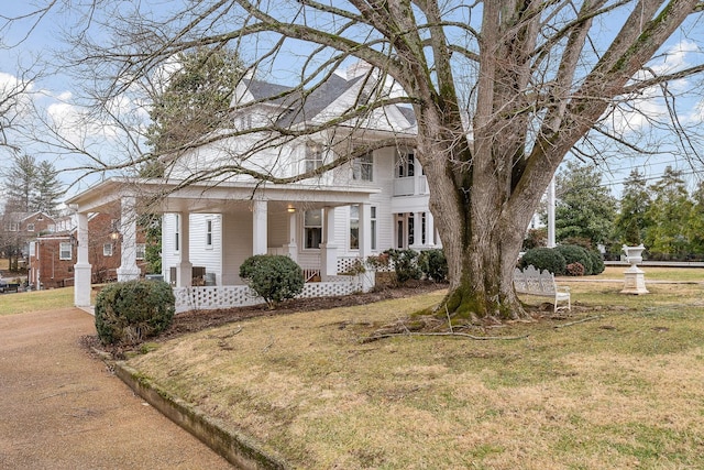 view of property exterior with a lawn