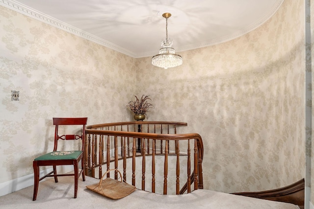 interior space featuring ornamental molding, carpet floors, and a notable chandelier