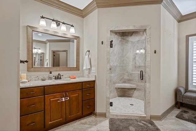 bathroom with vanity, ornamental molding, and walk in shower