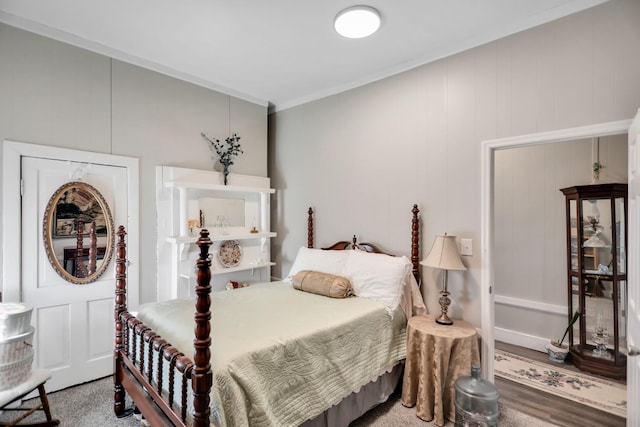 bedroom with crown molding