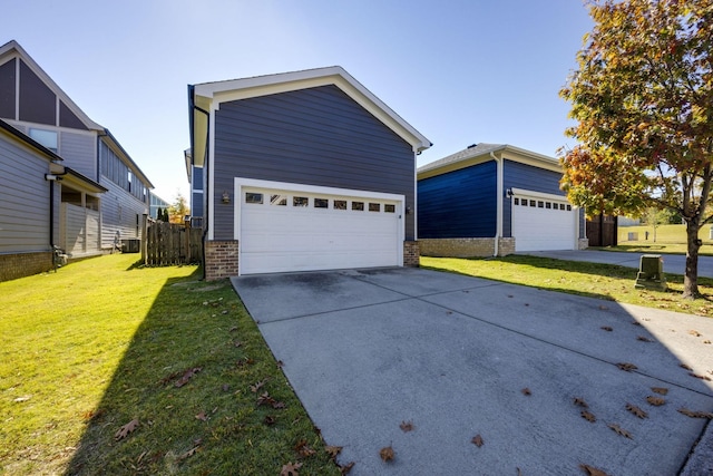 view of front of home featuring a garage, brick siding, a front yard, and fence