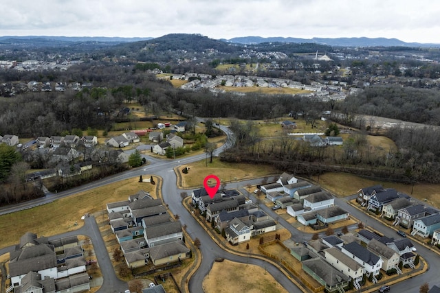 drone / aerial view with a mountain view and a residential view