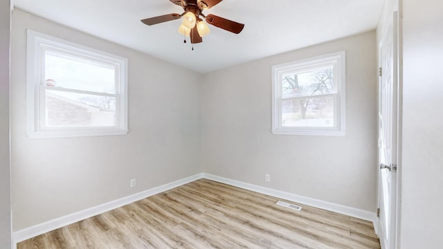 unfurnished room featuring ceiling fan and light hardwood / wood-style flooring