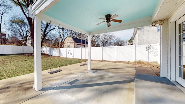 view of patio featuring ceiling fan