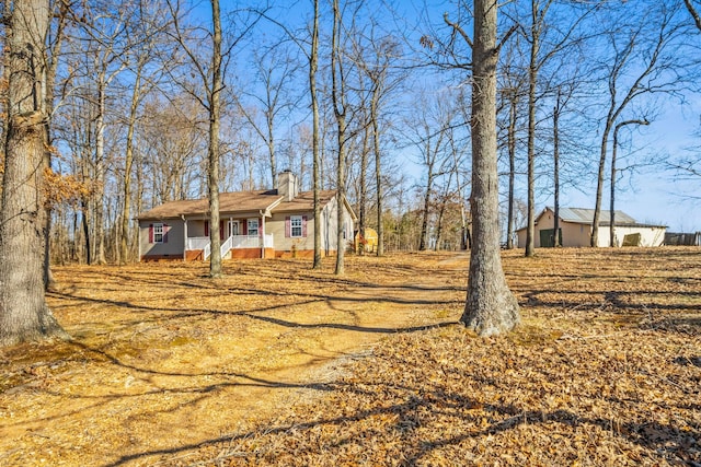 view of front of property featuring covered porch